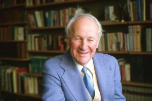John Stott in his study